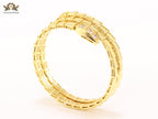 Gold triple layered serpentine bracelet with cz