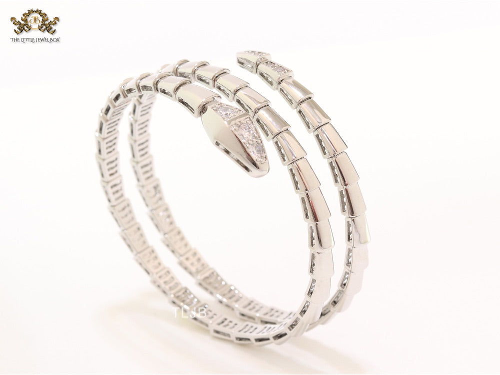 Platinum triple layered snake bracelet with cz