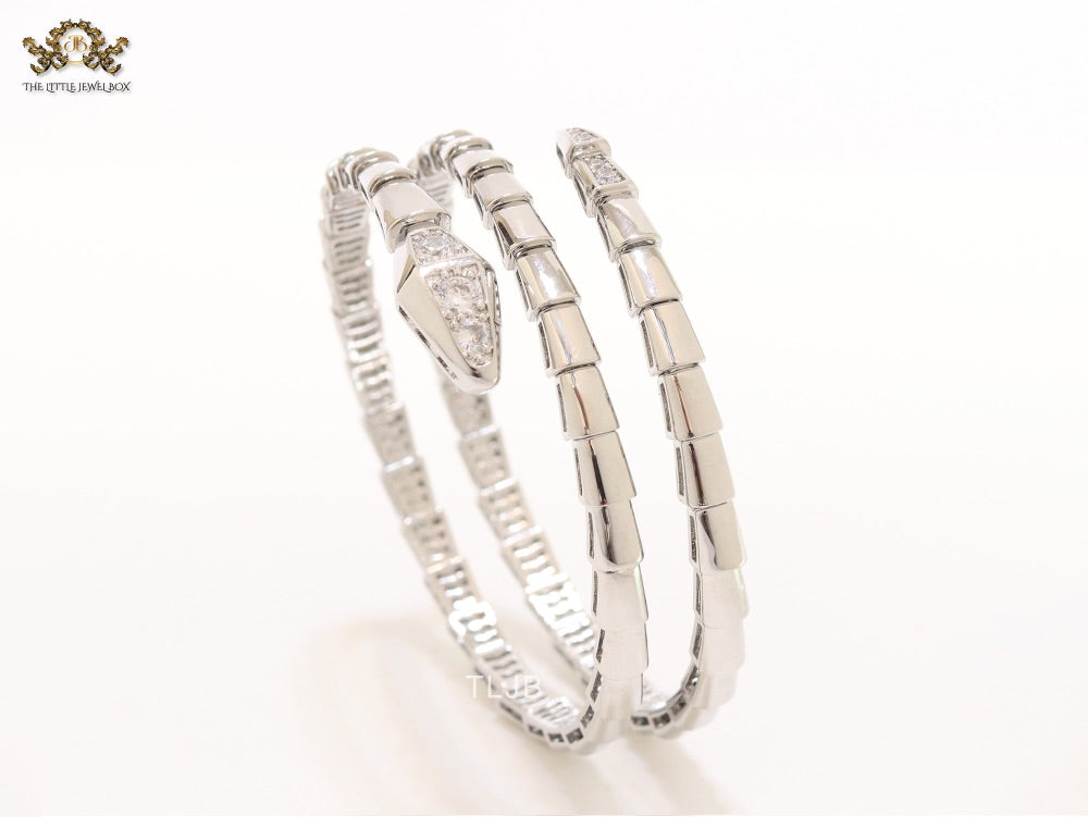 Platinum triple layered snake bracelet with cz