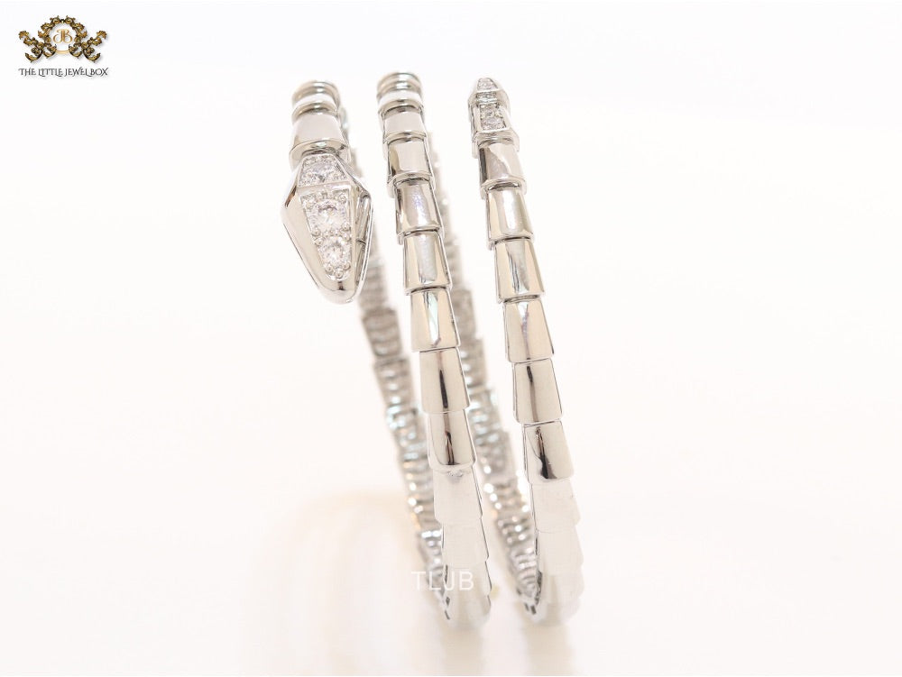 Platinum triple layered snake bracelet with cz