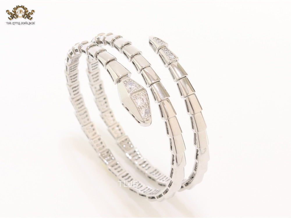 Platinum triple layered snake bracelet with cz