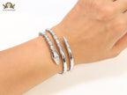 Platinum triple layered snake bracelet with cz