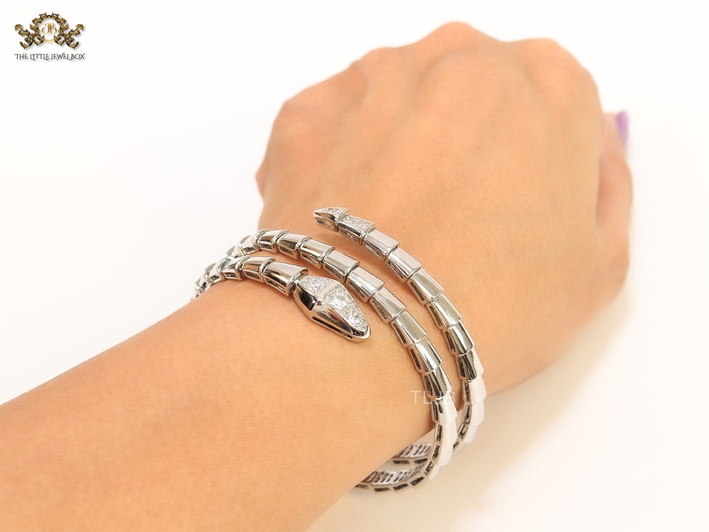 Platinum triple layered snake bracelet with cz