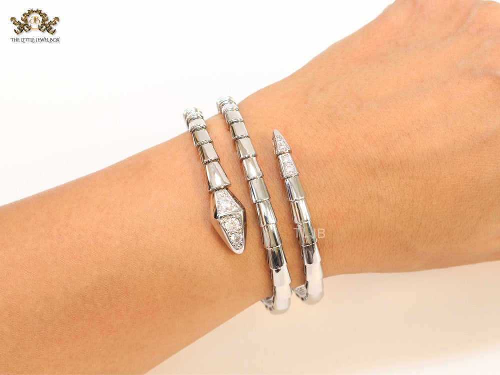 Platinum triple layered snake bracelet with cz