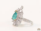 Adjustable drop shape fancy cz ring with green centre and platinum finish