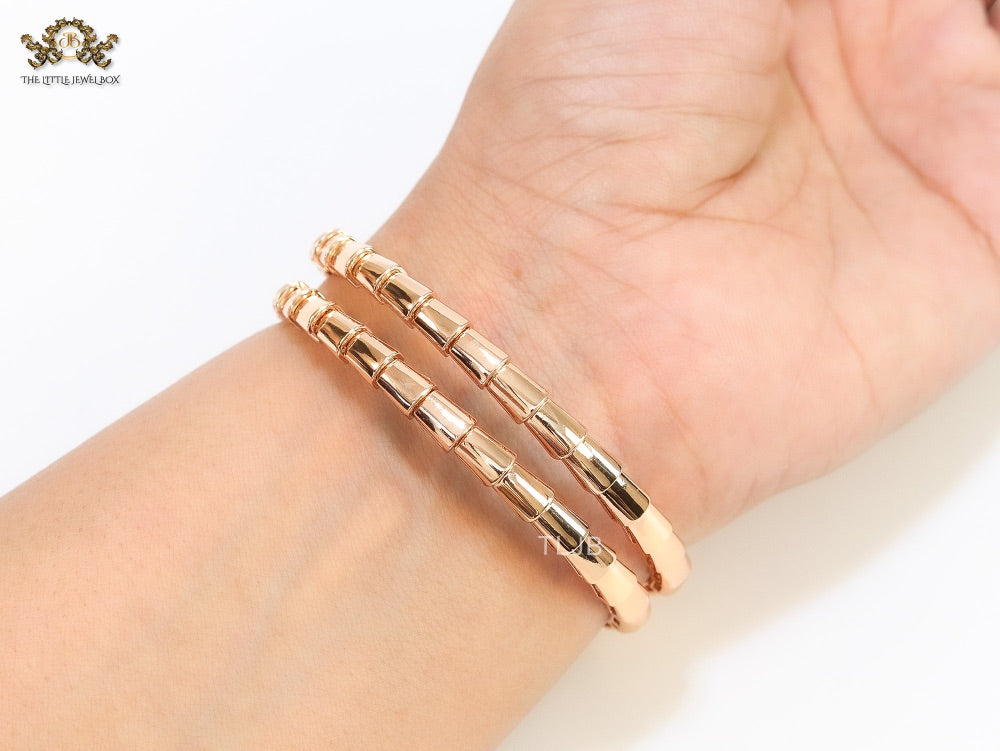 Rose Gold triple layered serpentine bracelet with cz