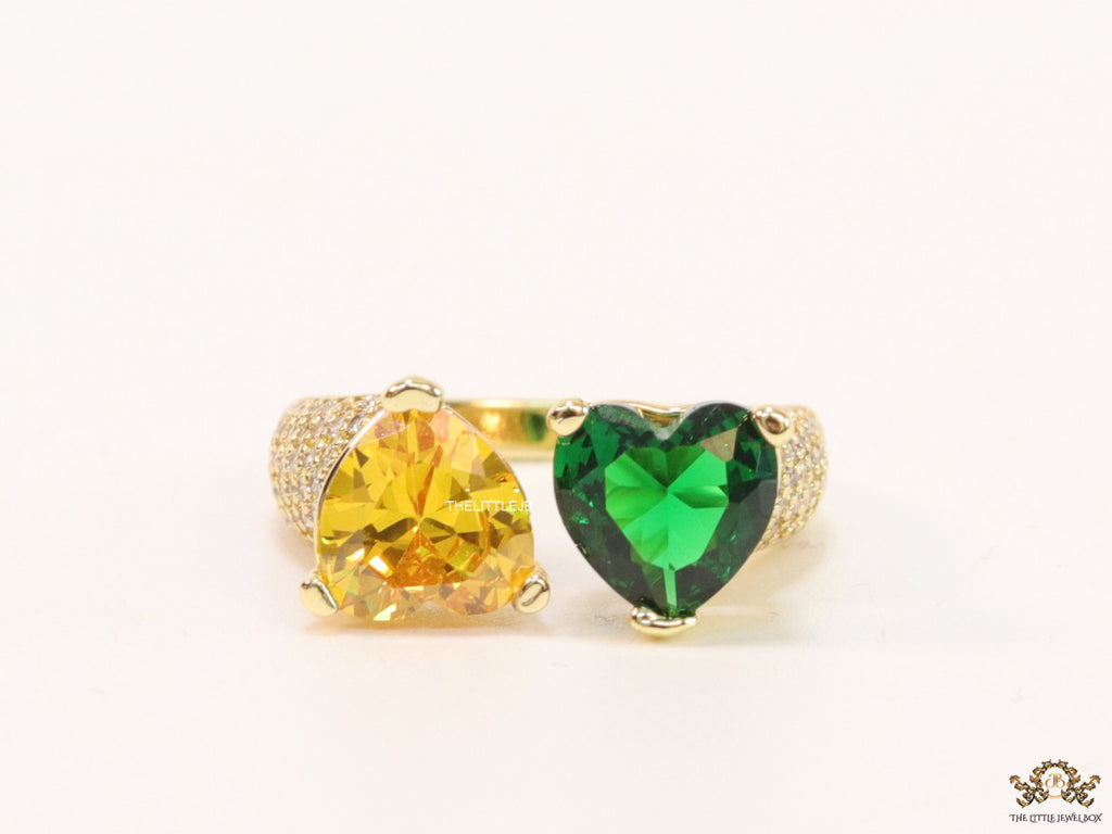 Open gold ring with twin hearts