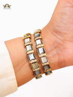 Serpenti black and gold three layer bracelet