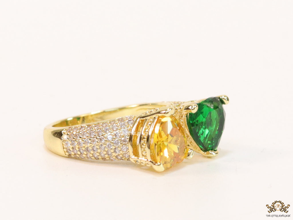 Open gold ring with twin hearts