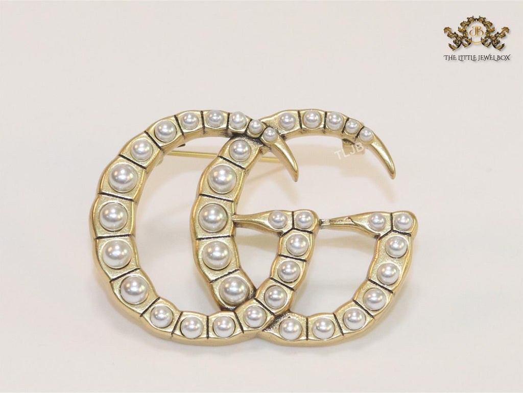 Double G pearl & gold brooch