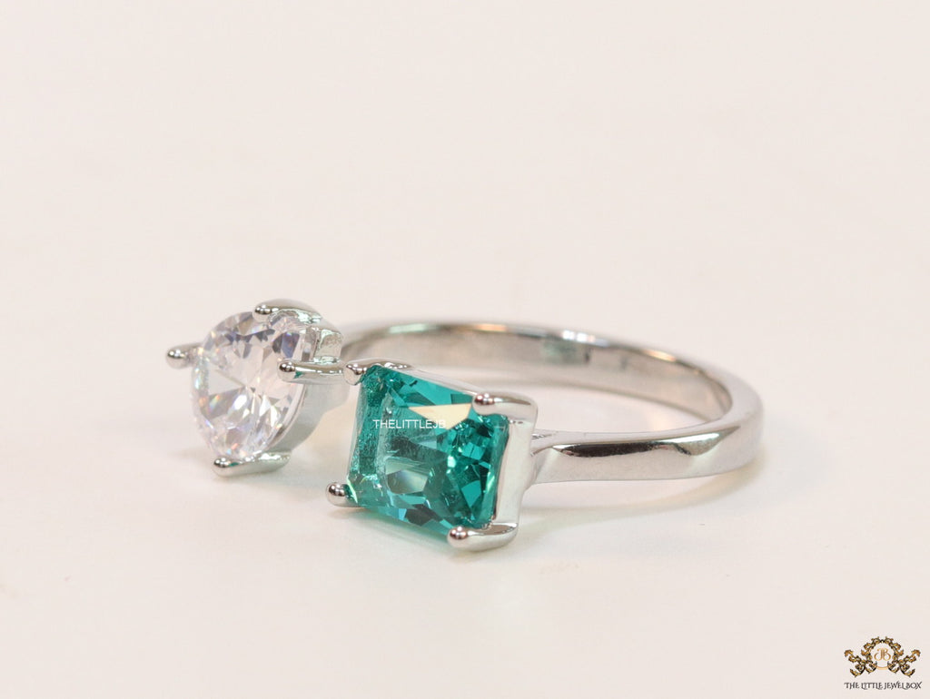 Top open rose gold ring with two asymmetrical czs