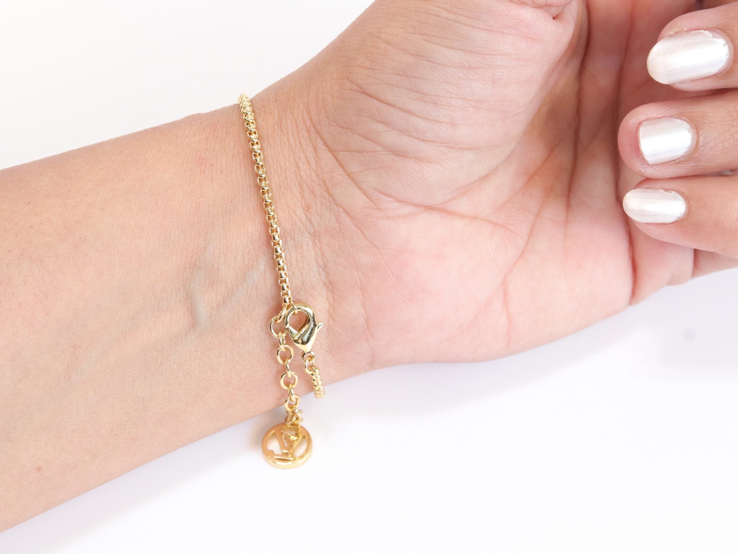 Alphabet L & V cz gold bracelet