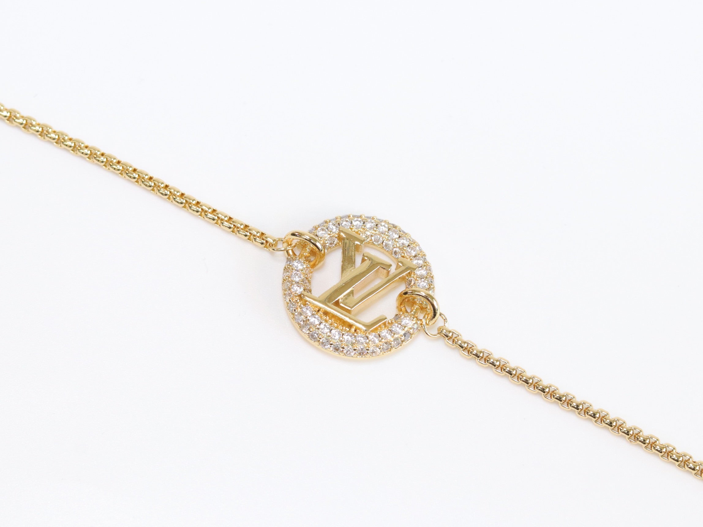 Alphabet L & V cz gold bracelet