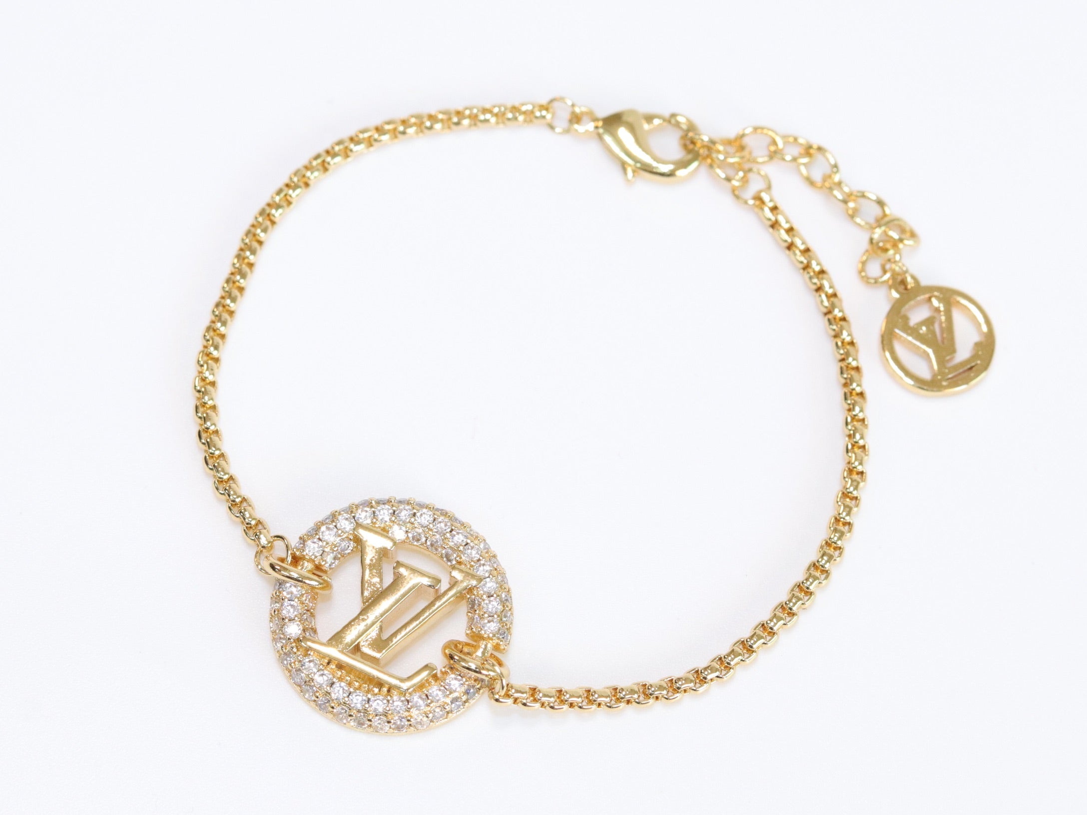 Alphabet L & V cz gold bracelet