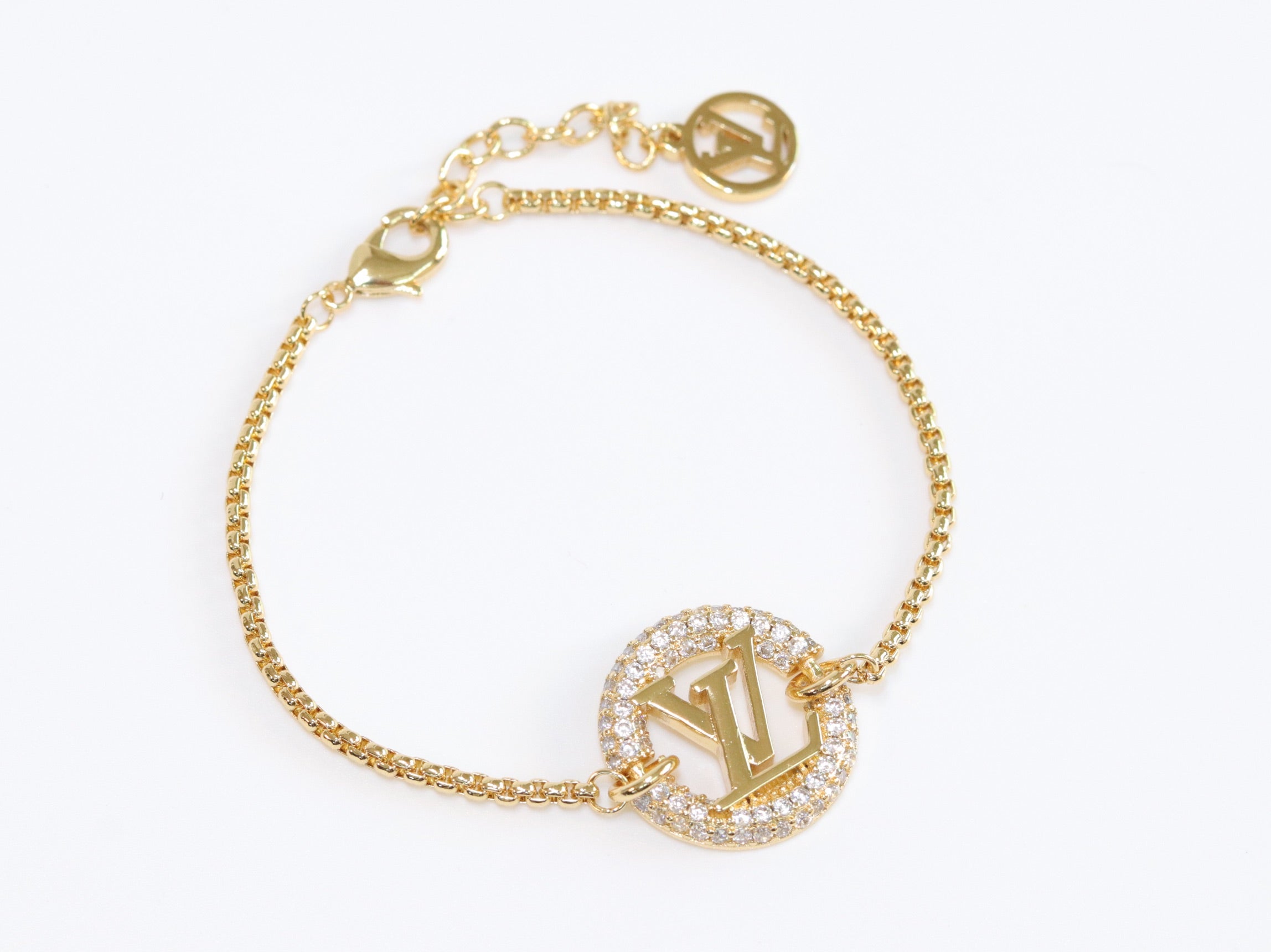 Alphabet L & V cz gold bracelet