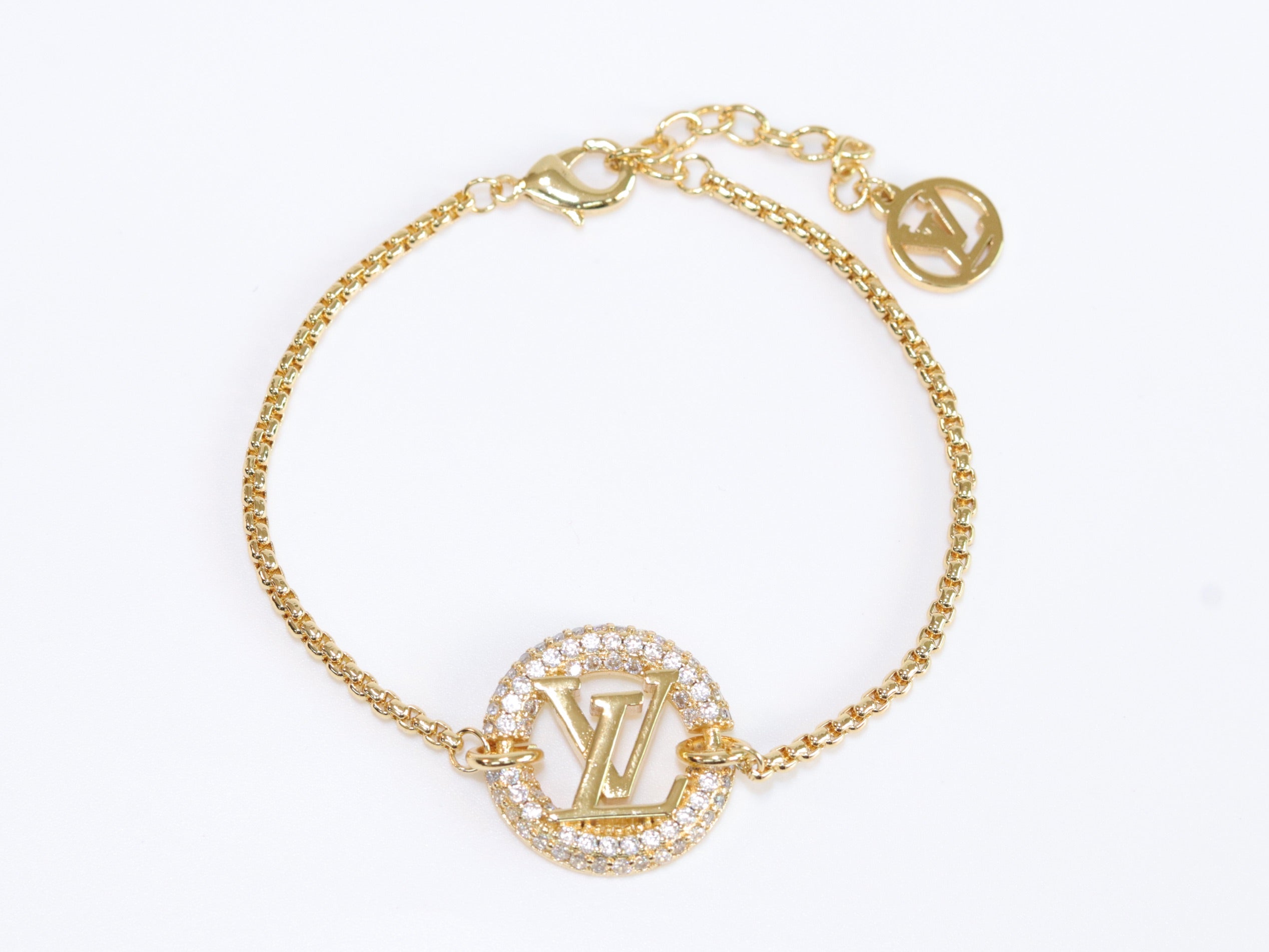 Alphabet L & V cz gold bracelet