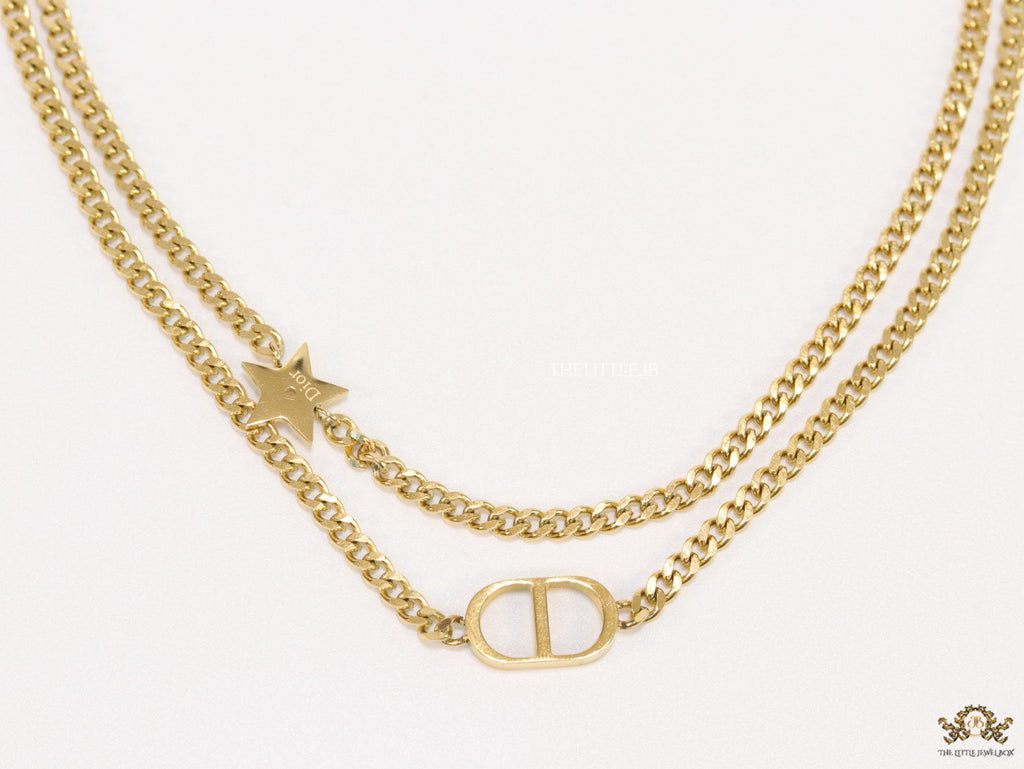 Dual chain necklace with alphabet and star motif