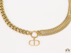Multiple golden chain necklace with alphabet pendant