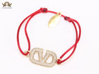 Alphabet V gold cz on Red Thread Bracelet