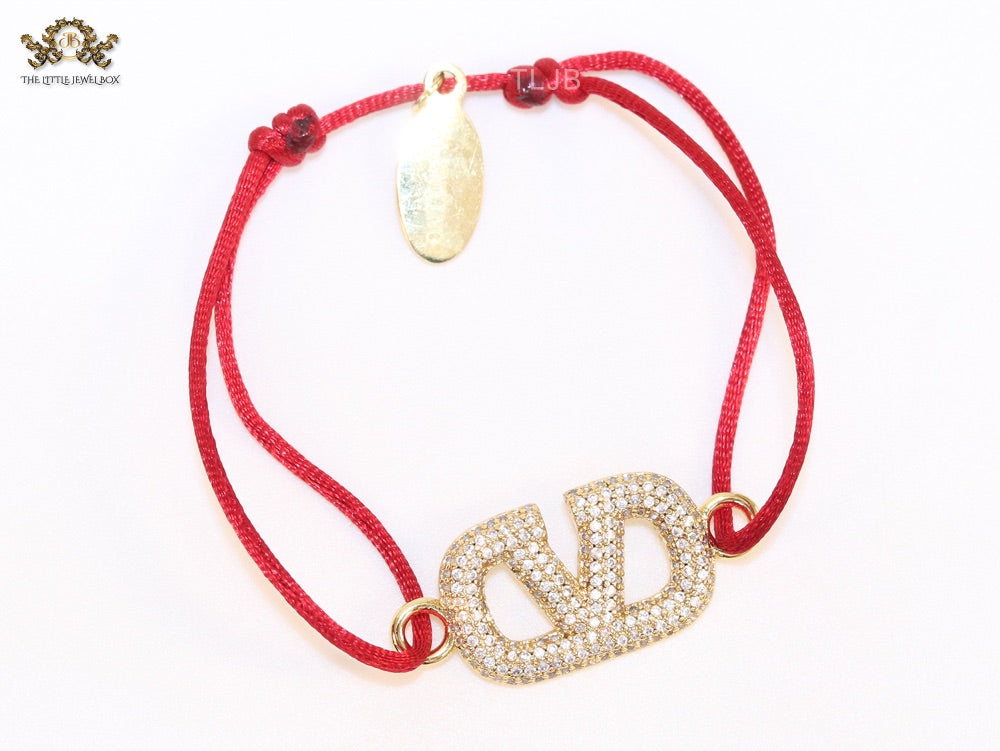 Alphabet V gold cz on Red Thread Bracelet