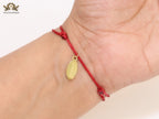 Alphabet V gold cz on Red Thread Bracelet
