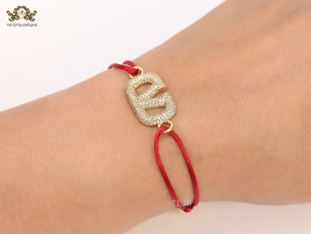 Alphabet V gold cz on Red Thread Bracelet