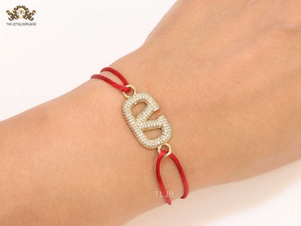 Alphabet V gold cz on Red Thread Bracelet