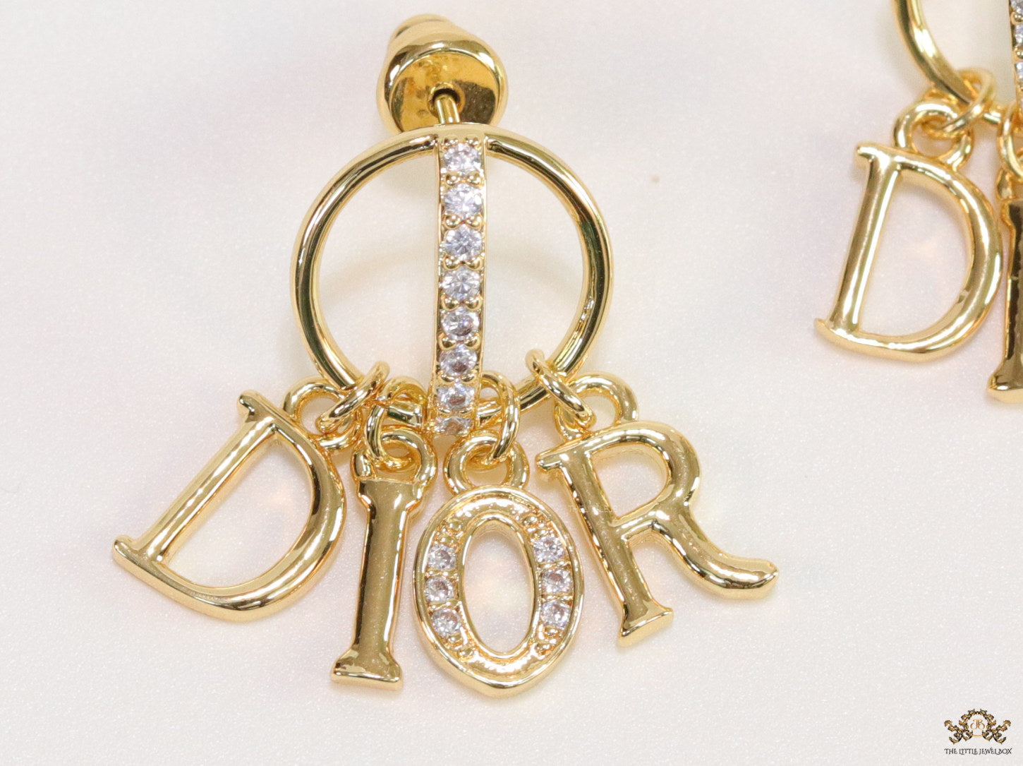 Gold plated alphabet earrings with cz