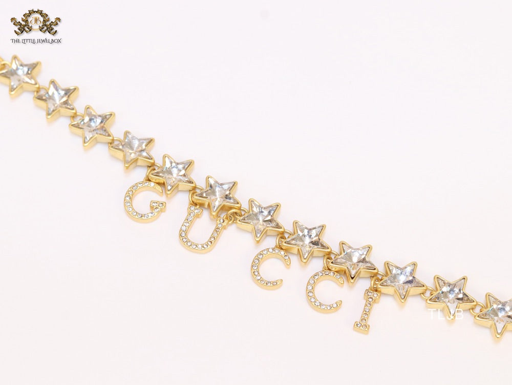 Double G and CZ stars gold charm bracelet