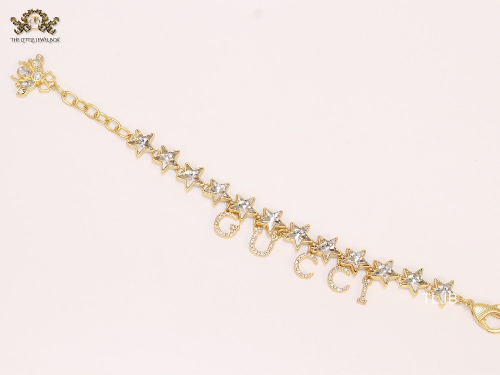 Double G and CZ stars gold charm bracelet