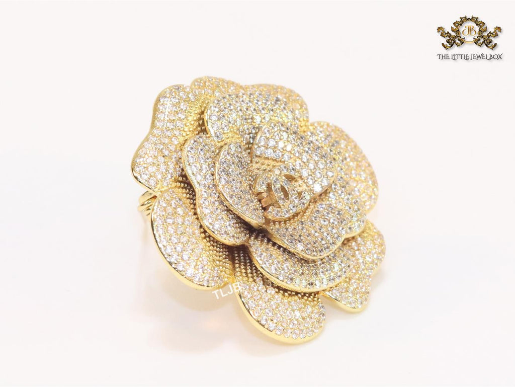 Double C gold & cz flower brooch