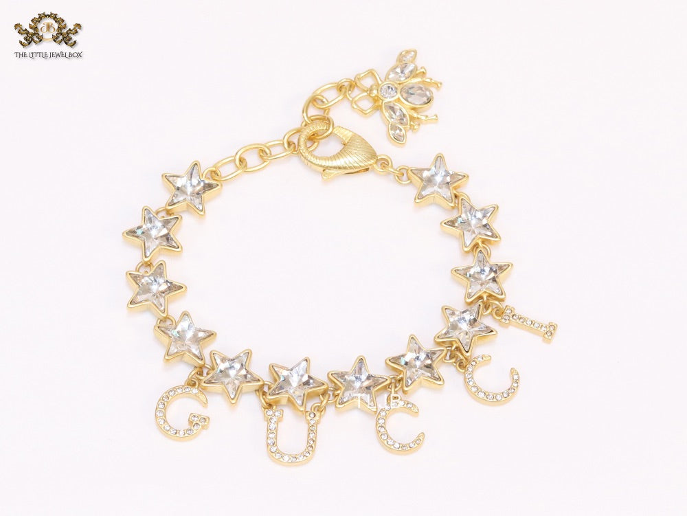 Double G and CZ stars gold charm bracelet