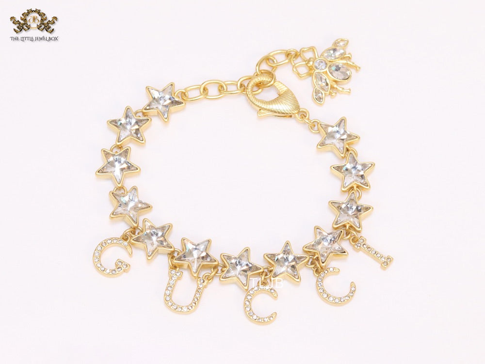 Double G and CZ stars gold charm bracelet