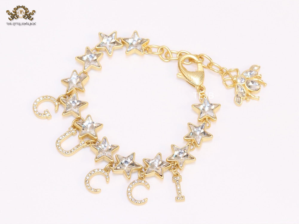Double G and CZ stars gold charm bracelet