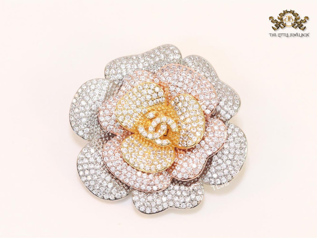 Double C platinum cz brooch with pink coloured details