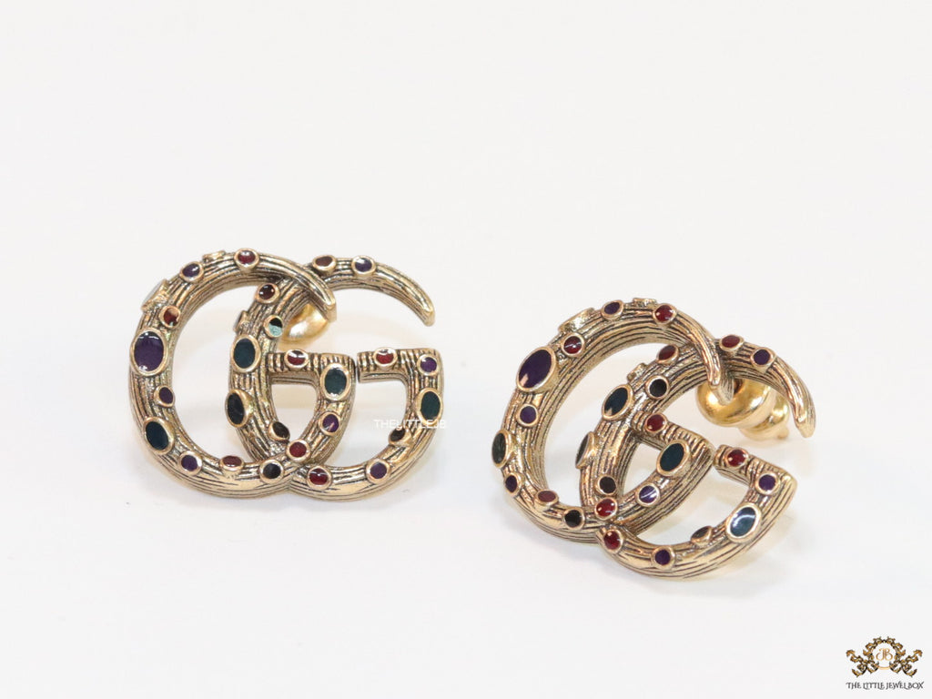Antique gold plated twin G motif studs with multicoloured enamel