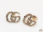 Antique gold plated twin G motif studs with multicoloured enamel