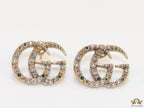 Antique gold plated twin G motif studs with multicoloured stones