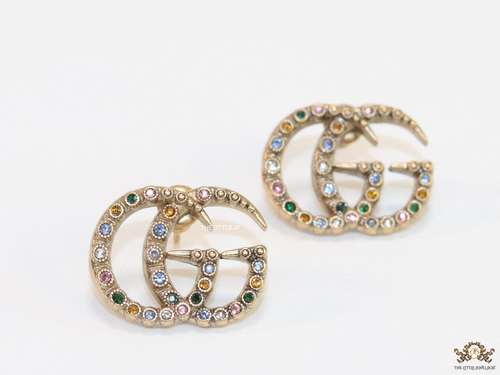 Antique gold plated twin G motif studs with multicoloured stones
