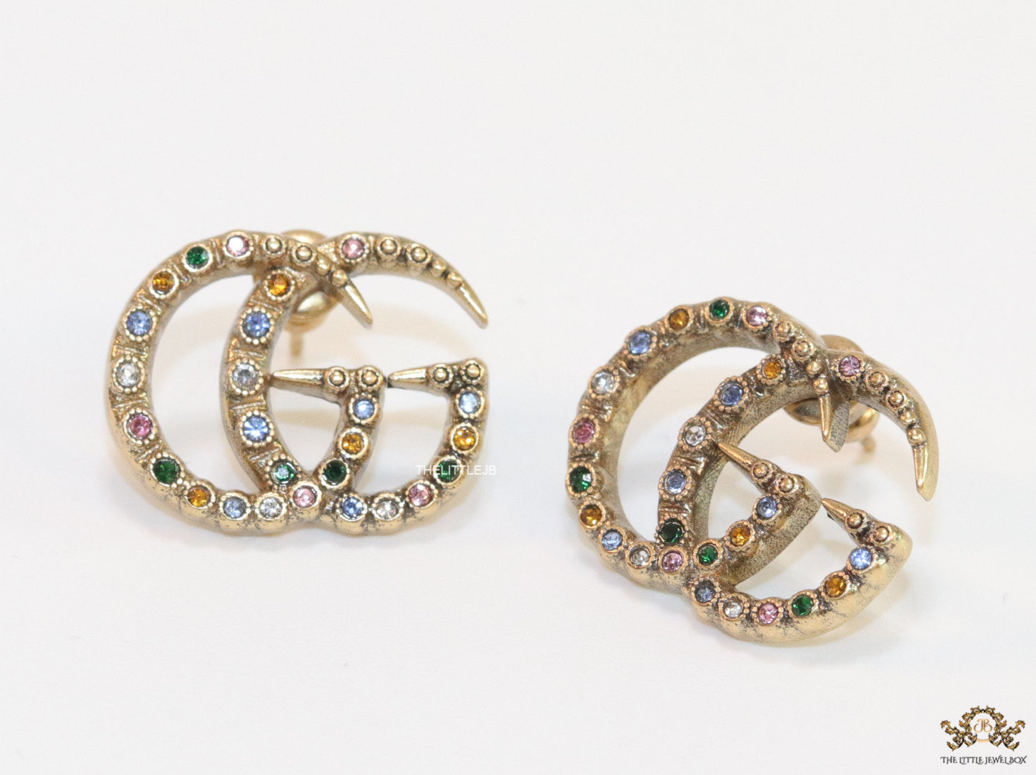 Antique gold plated twin G motif studs with multicoloured stones