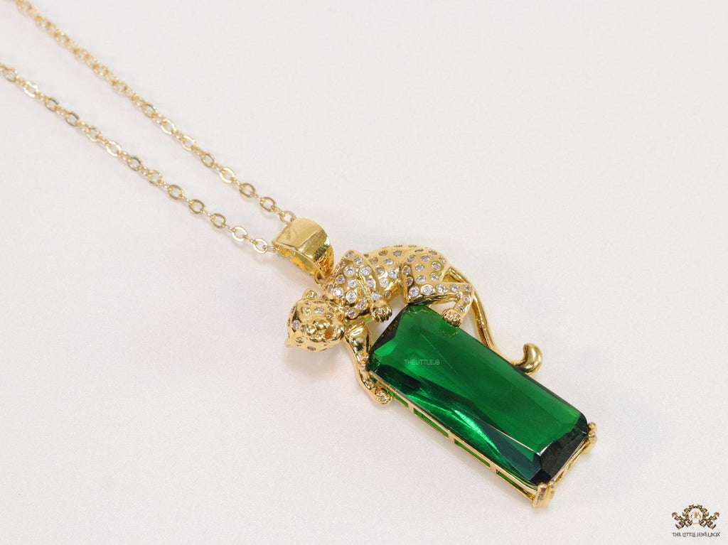 Gold plated leopard on green stone pendant necklace with cz