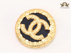 Double C gold foil and black enamel brooch