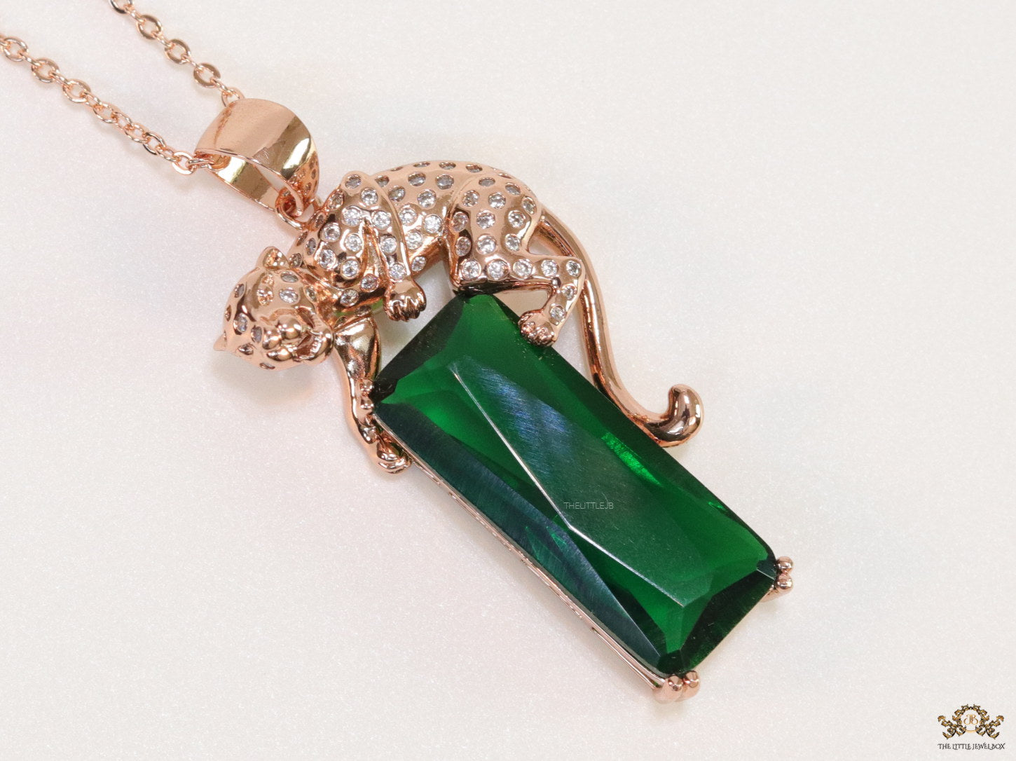 Rose gold plated leopard on green stone pendant necklace with cz