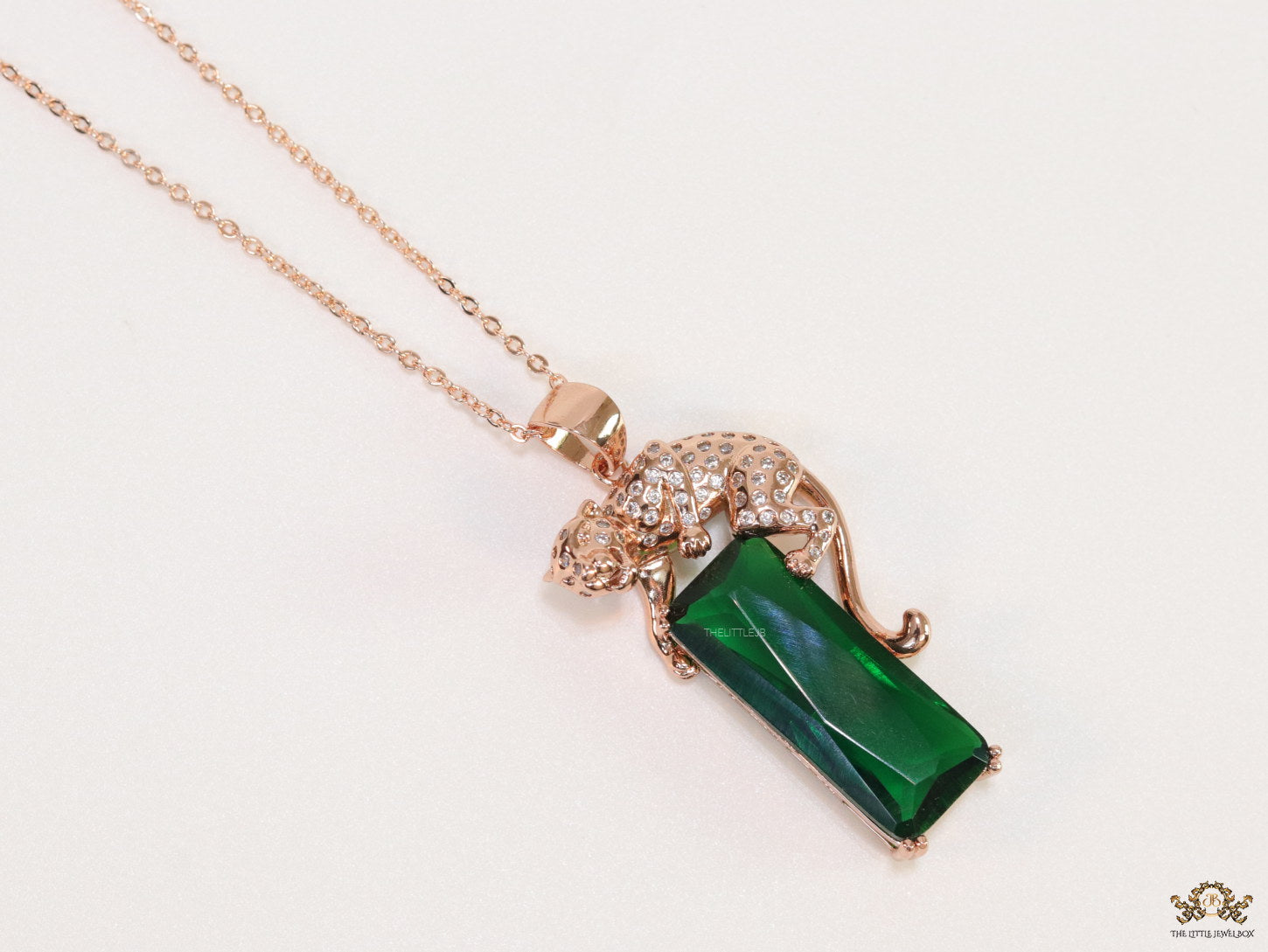 Rose gold plated leopard on green stone pendant necklace with cz