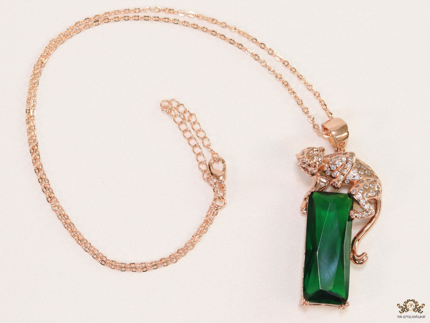 Rose gold plated leopard on green stone pendant necklace with cz