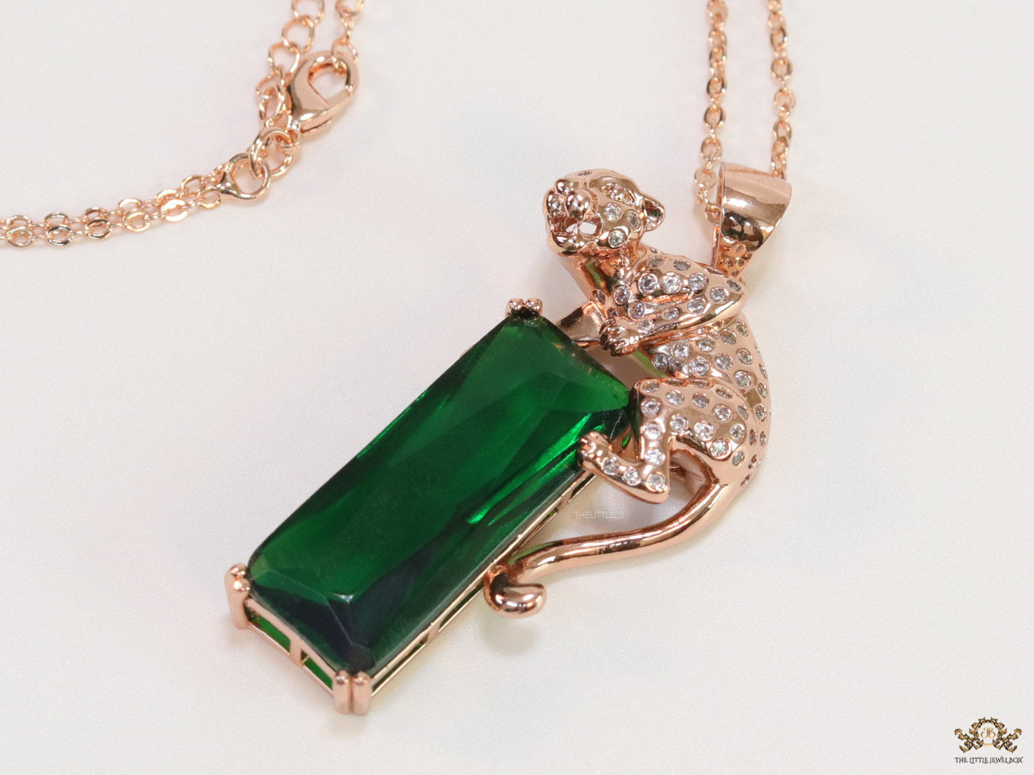 Rose gold plated leopard on green stone pendant necklace with cz