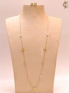 Pearl white clover heart and other shape charms on a sleek long gold plated chain with matching studs