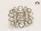 Double G brooch with uncut stones