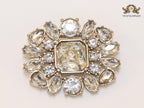 Double G brooch with uncut stones