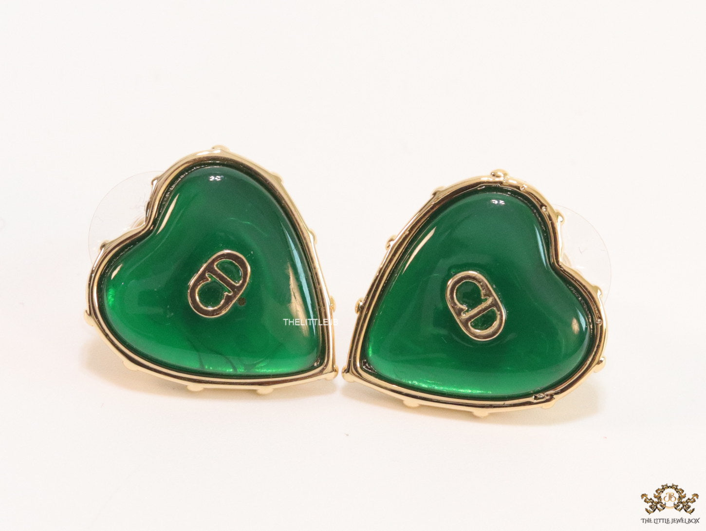 Heart shape green stud earrings with golden alphabets